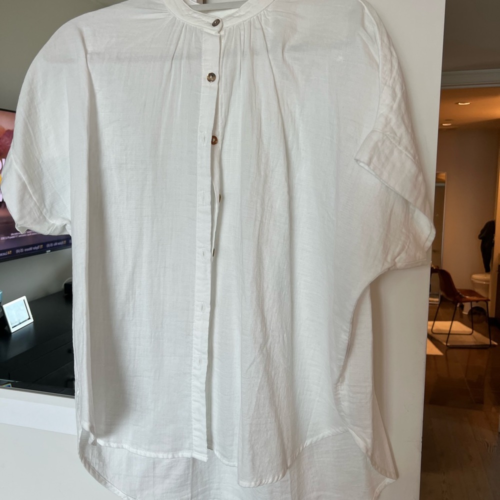 White cotton gauzy sleeves caps sleeves. All cotton